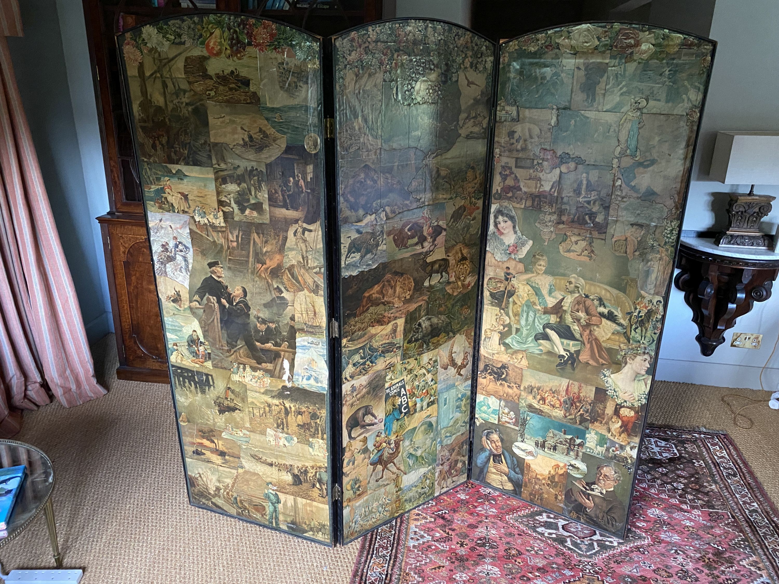 A Victorian double signed three fold scrap screen, mostly decorated with figures, width 63cm height 176cm